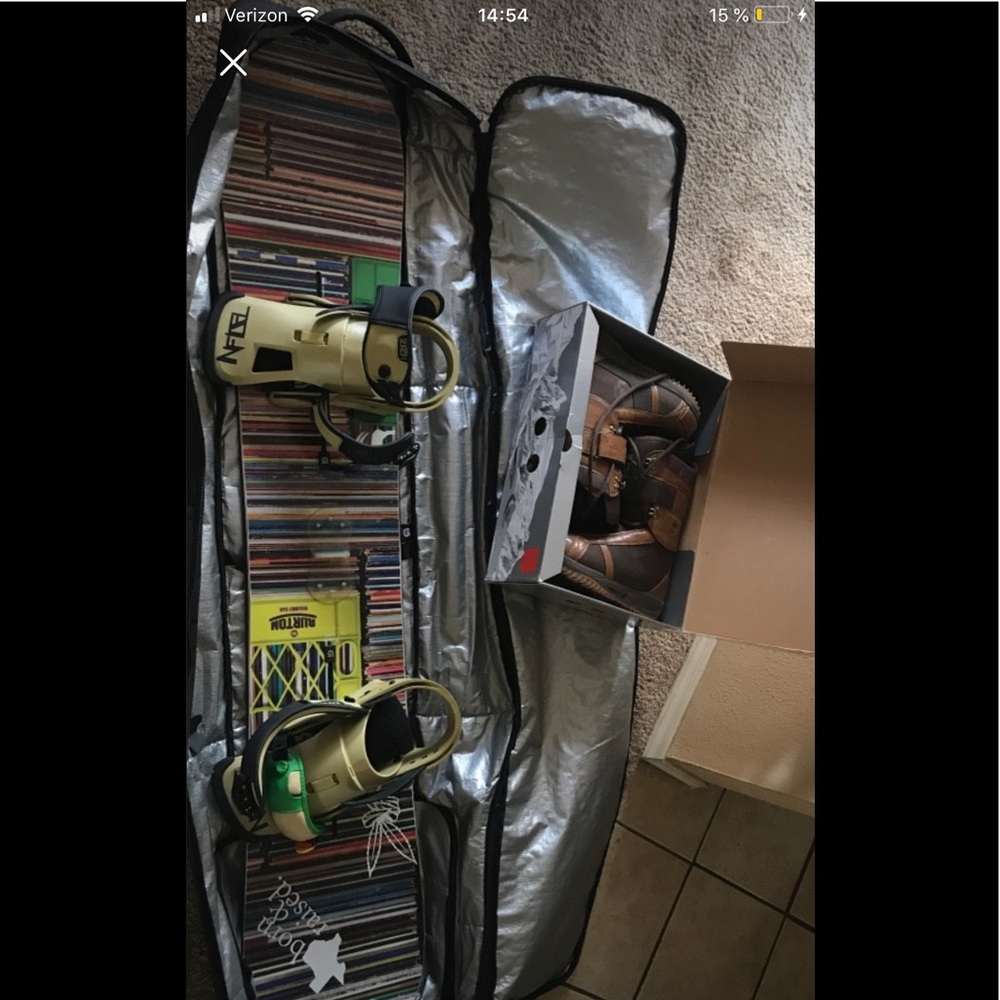 Snowboard w/ bindings + pair of men’s boots